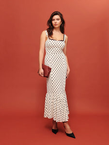 The Irisa Dress by Reformation features expert design details including back smocking and adjustable straps for a perfect fit. Its sweetheart neckline and back slit add subtle elegance, while the attached lace upper and back zipper ensure both style and practicality. Crafted from lightweight georgette with a dry handfeel, the dress is fully lined for comfort and modesty without sheerness. 