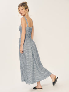 Introducing the Balia Linen Dress by Reformation! Embrace style and functionality with back smocking for a flattering fit, adjustable straps for comfort, and side pockets for convenience. The lined construction ensures a polished look without being sheer. Upgrade your wardrobe with this perfect summer dress!