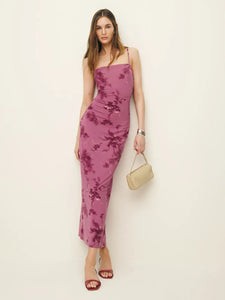 The Elise Knit Dress in Hothouse Rose by Reformation features adjustable straps and a straight neckline, combining customizable fit with classic style. Crafted from medium-weight, soft stretch jersey fabric, it offers comfortable wear with gentle flexibility, making it ideal for both casual and refined occasions. This dress balances structure and ease, ensuring a flattering silhouette throughout the day.