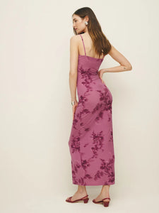 The Elise Knit Dress in Hothouse Rose by Reformation features adjustable straps and a straight neckline, combining customizable fit with classic style. Crafted from medium-weight, soft stretch jersey fabric, it offers comfortable wear with gentle flexibility, making it ideal for both casual and refined occasions. This dress balances structure and ease, ensuring a flattering silhouette throughout the day.