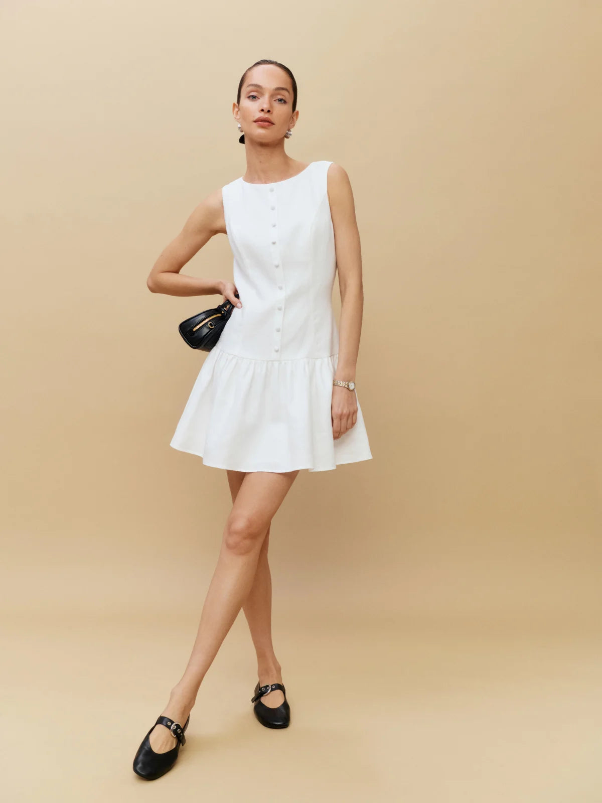 Discover the perfect balance of sophistication and comfort with our Keoni Mini Dress by Reformation. Made from lightweight and breathable linen fabric, this dress features a boat neckline and a flattering A-line silhouette. Perfect for any occasion, check out our size and fit guide for the perfect fit.