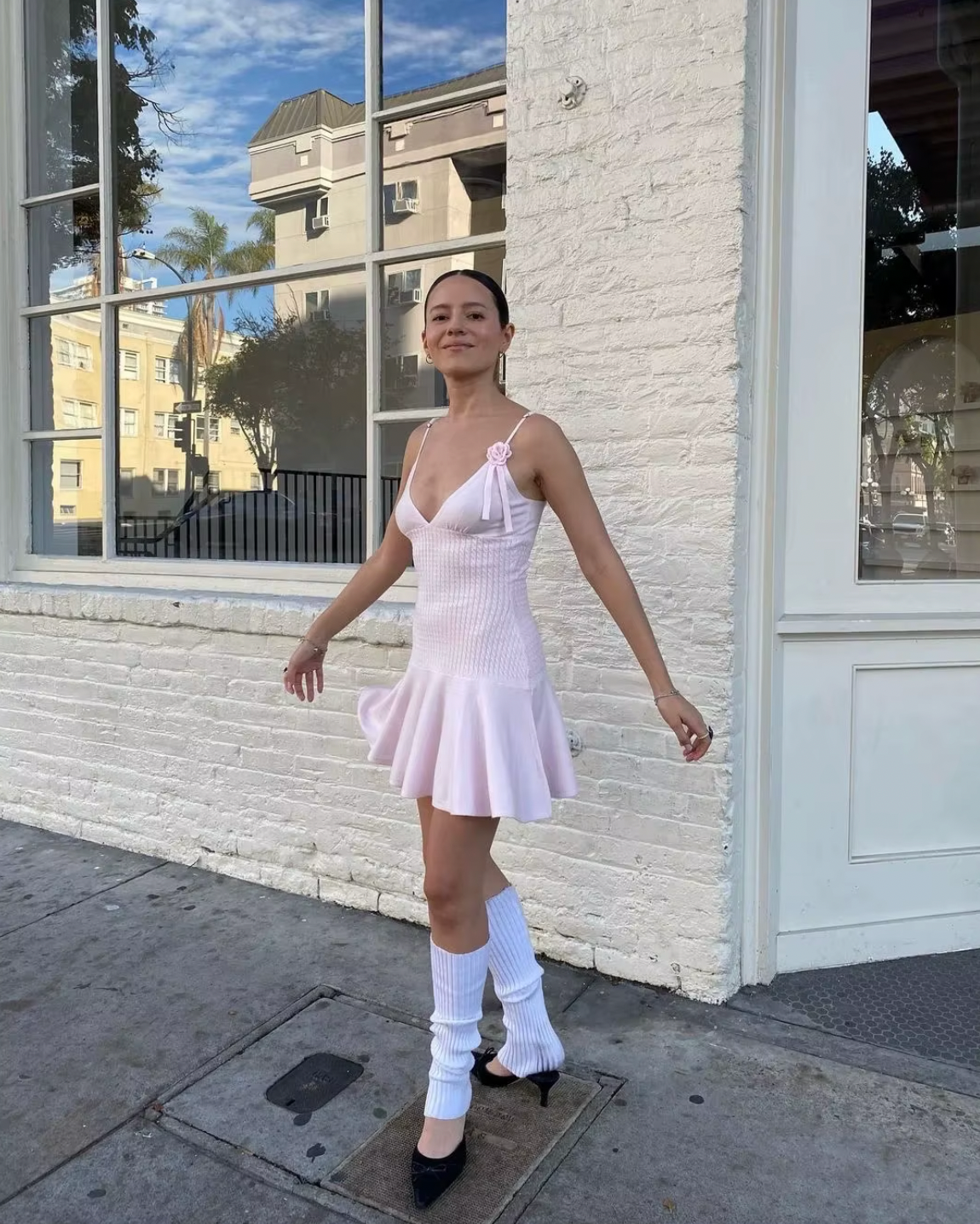 Introducing the Houston Knit Dress by Frankies Bikinis, the perfect dress for your casual outfit. Made from cloud knit fabric, in a beautiful Rose Quartz color. Features include adjustable shoulder straps and a custom knit rose & ribbon detail. Stay warm and stylish with the coziest dress of the season.