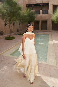 The Fia Maxi Dress embodies relaxed elegance with its timeless silhouette and flowing drop-waist design. Crafted to move gracefully with you, it drapes gently over the body for a flattering and effortless fit that never clings. Perfect for those seeking understated sophistication and comfort in one seamless piece.