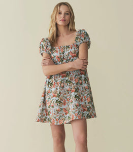 The Julie Cotton Mini Dress in Calico Garden by Doen combines lightweight cotton fabric with a delicate floral print for breathable comfort and timeless style. Its mini length and tailored fit offer a flattering silhouette suitable for warm days and casual outings, while the soft material ensures ease of movement. Ideal for those seeking an effortless yet refined look, this dress blends classic design with everyday practicality.