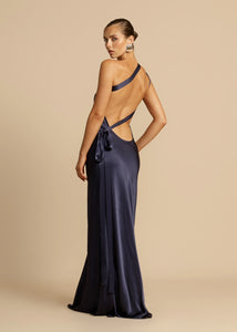 Experience modern elegance with Monique Maxi Dress. Made from luxurious, curve-enhancing viscose, this one-shoulder gown features a stunning open back and sophisticated crossover detailing. Perfect for starlit nights or glamorous events, unleash your inner diva and make a lasting impression with Monique.