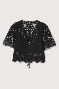 The Gianna Tie Top from Sea New York blends delicate lace detailing with a relaxed fit for effortless elegance. Crafted from 100% cotton with polyester embroidery, it features short flowy sleeves and a front tie closure, delivering both comfort and a romantic silhouette. Ideal for those seeking a refined yet easygoing style.