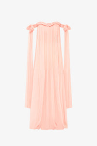 Elevate your elegance with this draped floor-length dress featuring an intricate braided neckline and a corset bodice lining for subtle structure. The tie arm straps flow gracefully into a train, complementing the relaxed silhouette. An invisible back zip closure ensures a seamless finish, while the sheer tulle lining adds delicate dimension to this sophisticated design.