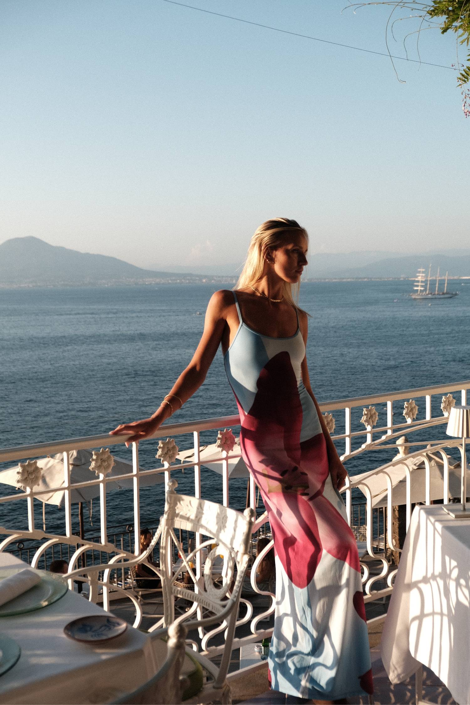 Experience the epitome of luxe Resort Wear with the Sky Lily Floral Slip Dress! Featuring a statement fuchsia Lily on a contrasting pale blue background, this fully lined dress accentuates the waistline and flatters the silhouette. Make a lasting impression in this stunning piece.