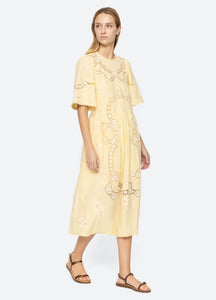 Elevate your wardrobe with the Vesna Embroidered Midi Dress by SEA NY, featuring delicate embroidery and scalloped trim for a refined finish. Its crew neckline and short sleeves complement the flattering A-line silhouette, while the hem gracefully falls below the knee. The back tie closure offers a tailored fit, combining elegance with comfort. Crafted from a cotton, linen, and polyester blend, this dress is best maintained with dry cleaning to preserve its quality. Perfect for sophisticated occasions.