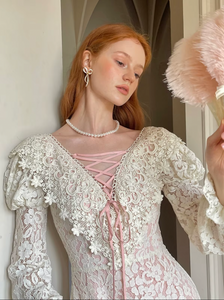 Unleash your vintage elegance in our Dahlia Dress! Perfect for spring and fall, this long dress features a slim and sexy silhouette with a flirty V-neck and charming long sleeves. Embrace French sweet luxury in this white lace dress, a must-have for any fashion-forward woman.