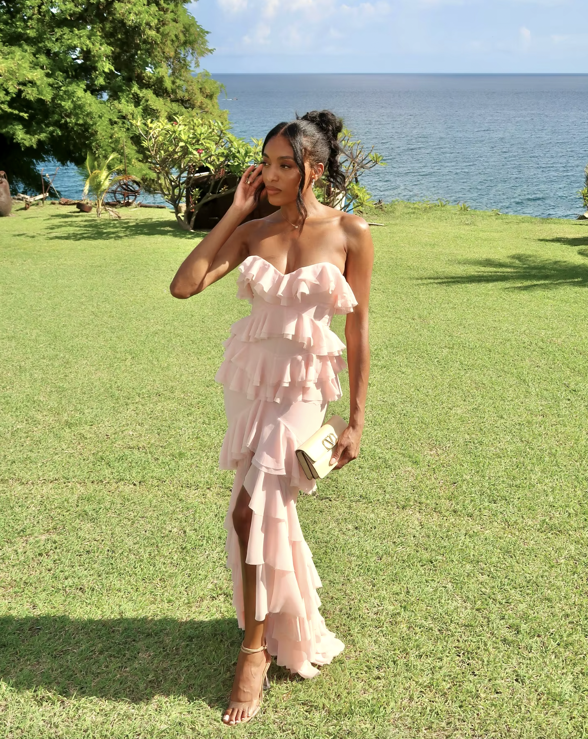 Elevate your style with the Oleksandra Maxi Dress. This luxurious dress features ruffled details and a daring open back, perfect for making a statement. Its flowy, sleeveless design and off-the-shoulder silhouette add a touch of elegance to any event. Be bold and stand out in this rose-colored dress.