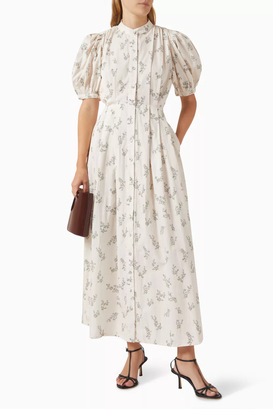 Defined by a fit-and-flare silhouette, the Adaline dress is finished with voluminous puffed sleeved. Cut from crisp cotton, the elegant silhouette features soft pleats throughout the top, a self-tie waist and pockets for keeping a lip gloss and card holder.