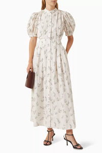 Defined by a fit-and-flare silhouette, the Adaline dress is finished with voluminous puffed sleeved. Cut from crisp cotton, the elegant silhouette features soft pleats throughout the top, a self-tie waist and pockets for keeping a lip gloss and card holder.