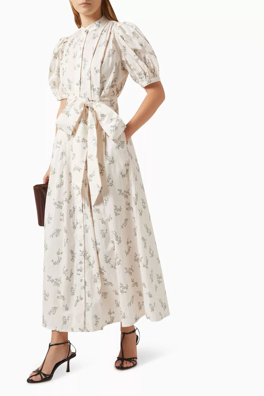 Defined by a fit-and-flare silhouette, the Adaline dress is finished with voluminous puffed sleeved. Cut from crisp cotton, the elegant silhouette features soft pleats throughout the top, a self-tie waist and pockets for keeping a lip gloss and card holder.