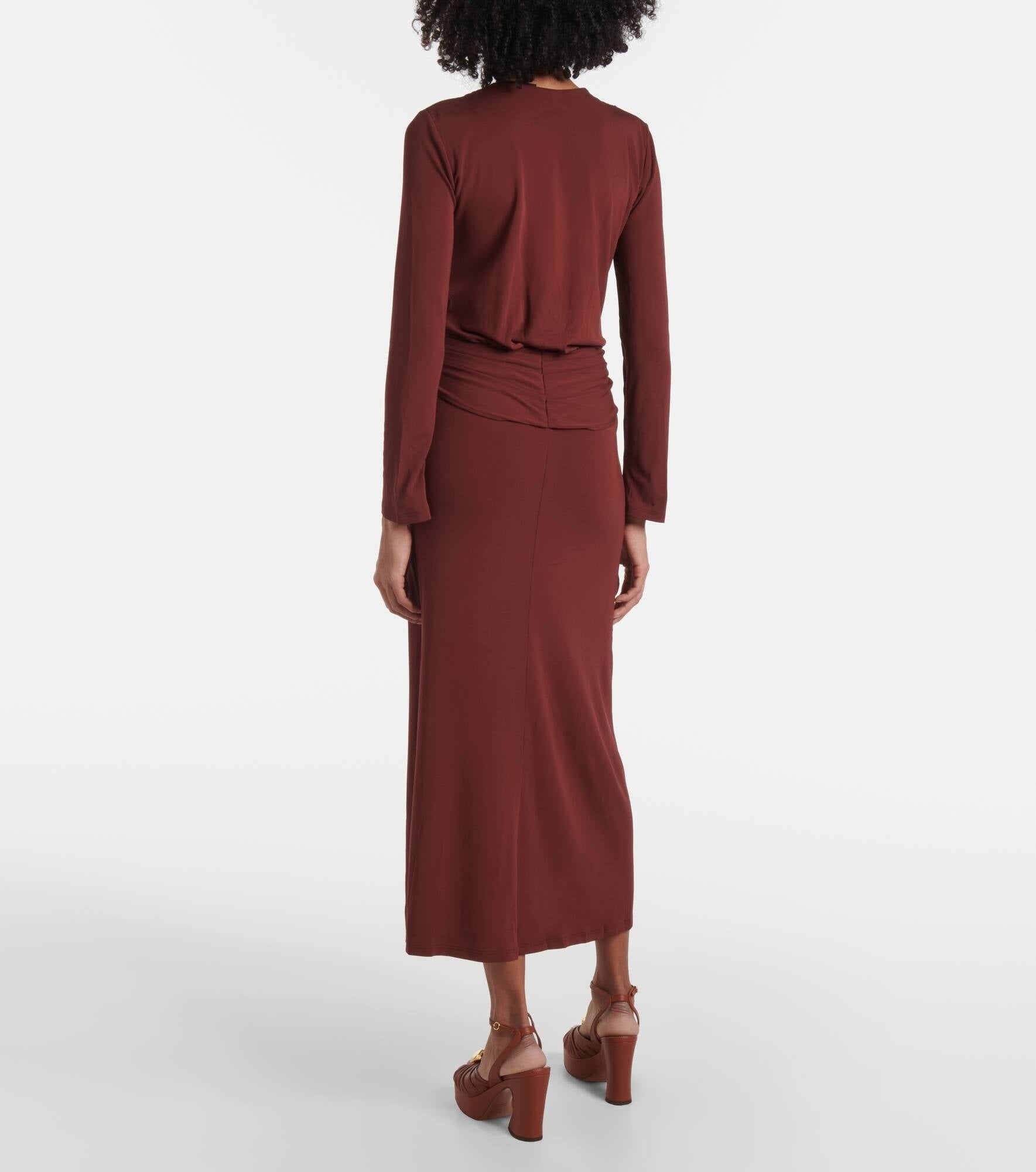 Elevate your wardrobe with the Finding Yourself draped jersey maxi dress by Johanna Ortiz. Crafted from soft, flowing jersey fabric, this dress features elegant draping that enhances silhouette and movement. Its maxi length offers refined sophistication, perfect for both daytime elegance and evening occasions. Designed for comfort without sacrificing style, this piece seamlessly blends timeless grace with modern ease.