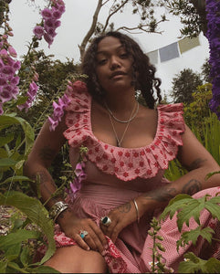 Be the life of the (gingham) party with the Doen Liesel Dress in Cherry Gingham. This playful frock features Parisian-inspired eyelet details and a bold cherry print. Perfect for a sunny day out with friends, or a whimsical addition to your Barbie collection. Save now and visit our site for more Doen dresses!