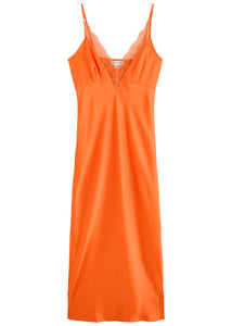 The Caetana dress combines sophistication and allure with adjustable shoulder straps and a plunging V-neck that enhances your silhouette. Detailed with scalloped eyelash lace trim and side splits at the hem, this dress adds a delicate, feminine touch while allowing graceful movement. Perfect for making a memorable impression at any event.