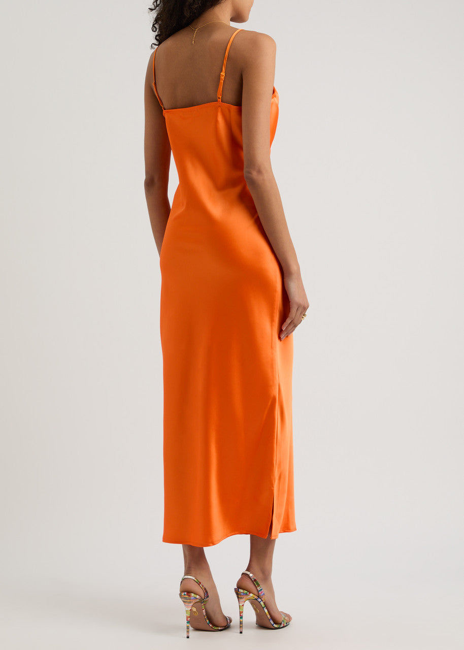 The Caetana dress combines sophistication and allure with adjustable shoulder straps and a plunging V-neck that enhances your silhouette. Detailed with scalloped eyelash lace trim and side splits at the hem, this dress adds a delicate, feminine touch while allowing graceful movement. Perfect for making a memorable impression at any event.