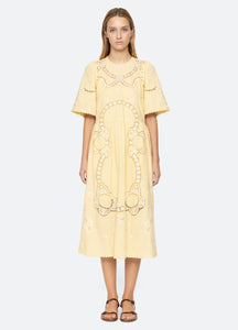 Elevate your wardrobe with the Vesna Embroidered Midi Dress by SEA NY, featuring delicate embroidery and scalloped trim for a refined finish. Its crew neckline and short sleeves complement the flattering A-line silhouette, while the hem gracefully falls below the knee. The back tie closure offers a tailored fit, combining elegance with comfort. Crafted from a cotton, linen, and polyester blend, this dress is best maintained with dry cleaning to preserve its quality. Perfect for sophisticated occasions.
