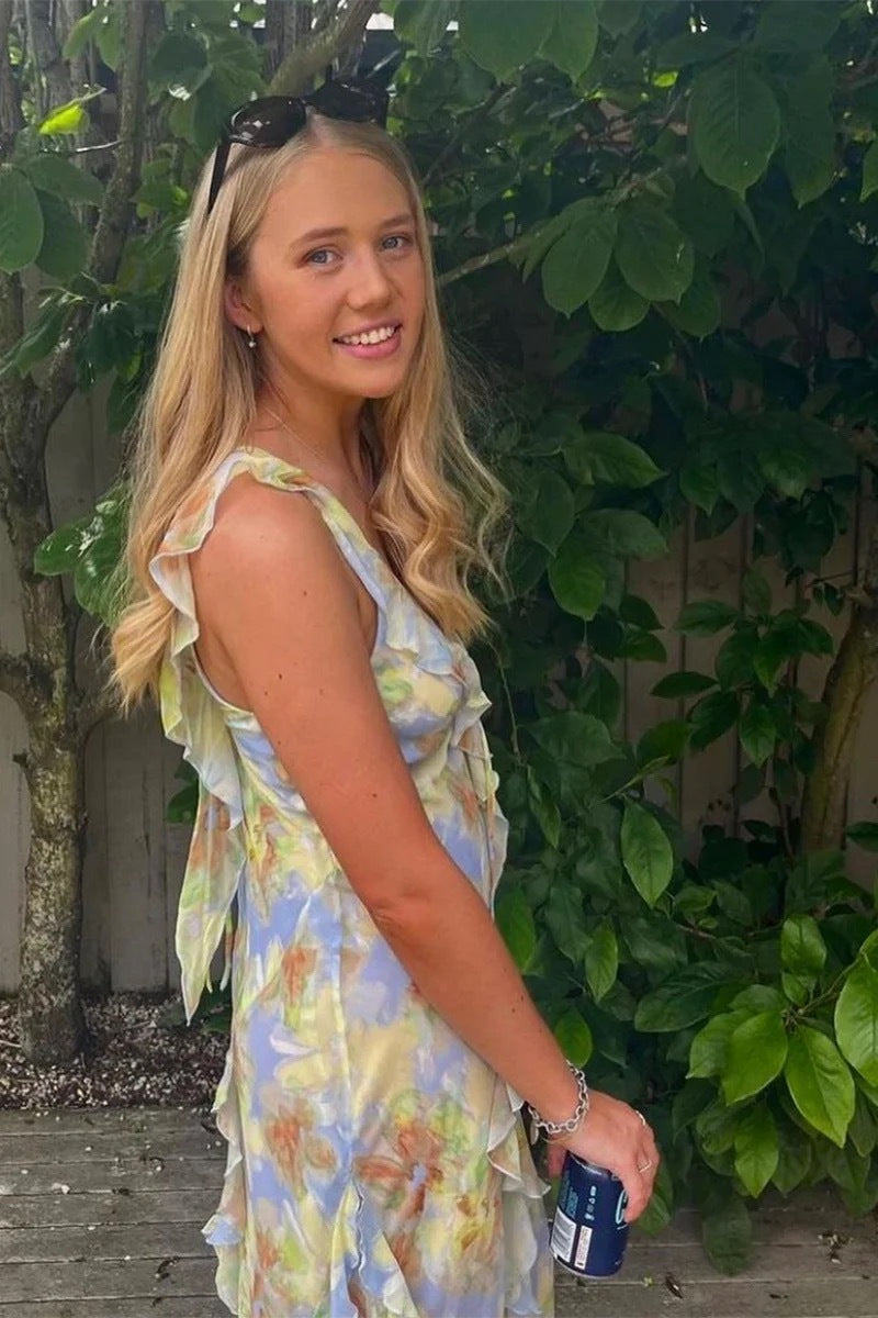 Crafted from lustrous silk print fabric and cut on the bias, the Courtney Frill Maxi Dress by Bec + Bridge embodies sophisticated ease. This statement piece showcases a plunging V-neckline, asymmetrical raw-cut shoulder detail, and artfully placed raw-cut ruffles that create movement and visual interest. The lace-up front closure and open V-back add architectural intrigue, making this an ideal choice for those seeking refined elegance with contemporary edge.