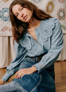 The Flavie Shirt combines timeless elegance with expert craftsmanship. Featuring a large embroidered collar that adds a refined, artisanal touch, this long-sleeve shirt boasts a classic button-down front for versatile styling. Its tailored design ensures a polished look suitable for both professional and casual settings, making it a sophisticated addition to any wardrobe.