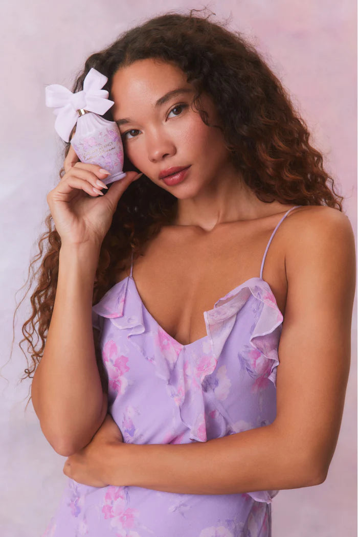 Designed with elegance and movement in mind, the Rialto Maxi Dress in Hibiscus captivates with its chiffon fabric and cascading asymmetrical ruffles that flow from neckline to hem. Its slightly fitted silhouette enhances your figure with subtle allure, while a discreet side seam zipper ensures a seamless fit. Perfect for dancing or any refined occasion, this dress combines comfort with sophisticated style effortlessly.