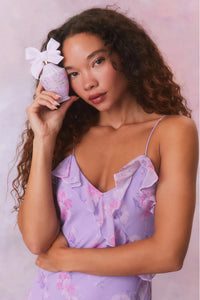 Designed with elegance and movement in mind, the Rialto Maxi Dress in Hibiscus captivates with its chiffon fabric and cascading asymmetrical ruffles that flow from neckline to hem. Its slightly fitted silhouette enhances your figure with subtle allure, while a discreet side seam zipper ensures a seamless fit. Perfect for dancing or any refined occasion, this dress combines comfort with sophisticated style effortlessly.