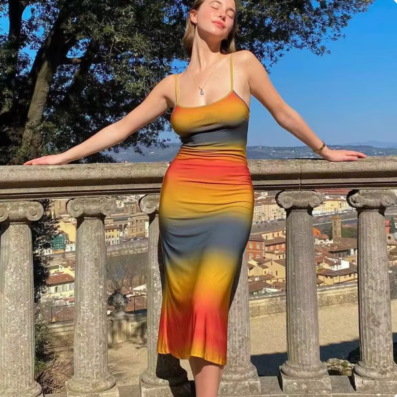 Introducing the Renata Slip Dress - the perfect blend of summer cool and effortless style. With a vibrant orange gradient color and low-cut spaghetti straps, this sleeveless dress is the perfect addition to your wardrobe. Let this dress take you from day to night with ease.