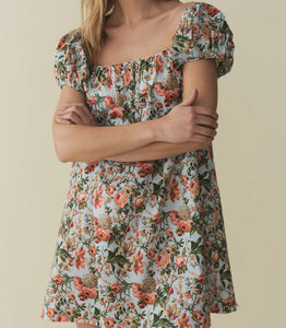 The Julie Cotton Mini Dress in Calico Garden by Doen combines lightweight cotton fabric with a delicate floral print for breathable comfort and timeless style. Its mini length and tailored fit offer a flattering silhouette suitable for warm days and casual outings, while the soft material ensures ease of movement. Ideal for those seeking an effortless yet refined look, this dress blends classic design with everyday practicality.