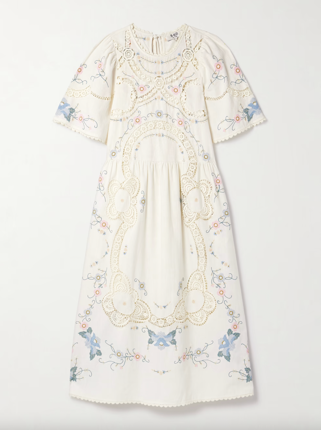 Crafted from a refined cotton and linen blend, the Vesna Linen Dress by SEA features delicate broderie anglaise trim and intricate embroidery, highlighting expert craftsmanship. Its midi length offers timeless elegance, while breathable fabrics ensure comfort in warmer weather. This dress effortlessly balances classic design with modern appeal, making it a versatile addition to a sophisticated wardrobe.