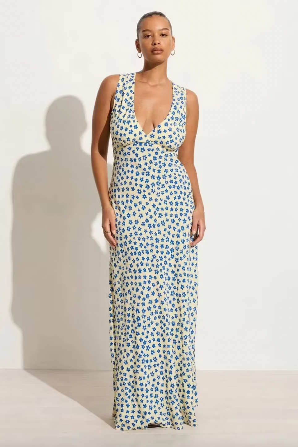 Experience the ultimate blend of style and comfort with the Acacia Maxi Dress. The bias cut and full length design create a flattering silhouette, while the V cut neckline adds a touch of elegance. Perfect for any occasion, this dreamy dress will have you looking and feeling your best.