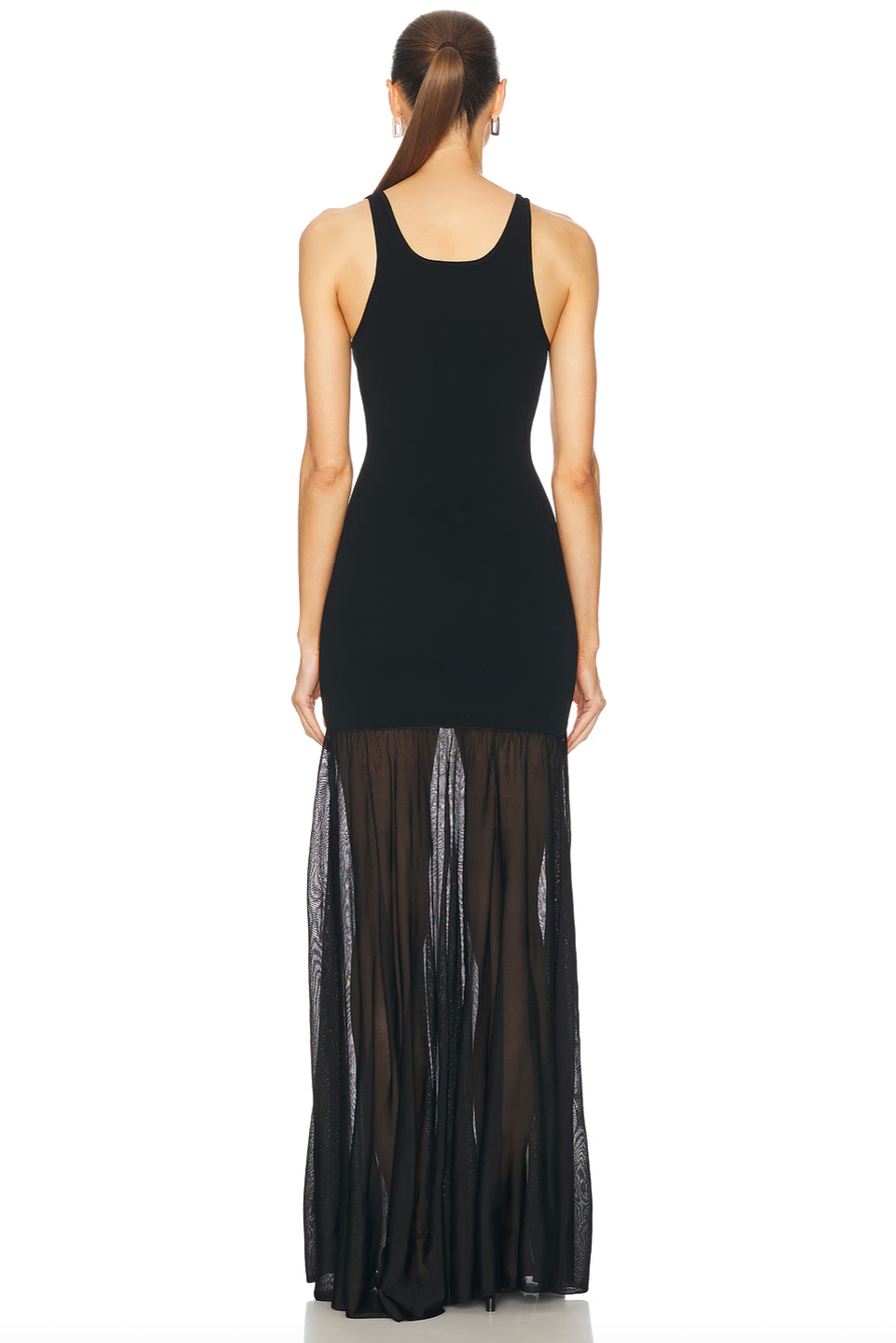 This black evening maxi dress by Toteme combines refined craftsmanship with elegant design. Crafted from fine knit fabric, its panelled construction offers a structured silhouette that flatters the figure. The scoop neck and sleeveless cut contribute to a sleek, timeless look, while the unlined design ensures comfortable wear throughout the evening. The flared skirt extends into a flowing, long length, making it an impeccable choice for formal events that demand both style and sophistication.