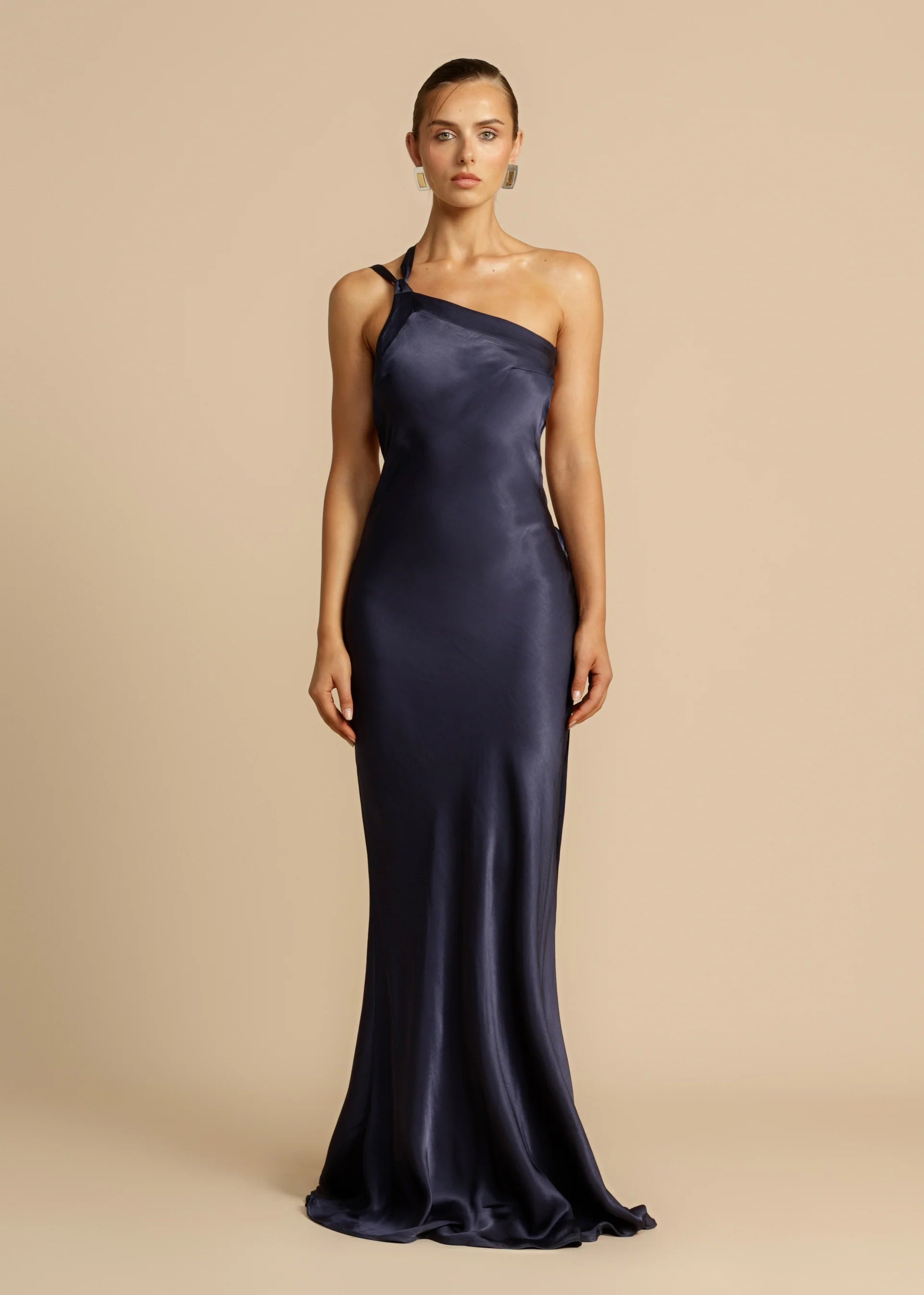 Experience modern elegance with Monique Maxi Dress. Made from luxurious, curve-enhancing viscose, this one-shoulder gown features a stunning open back and sophisticated crossover detailing. Perfect for starlit nights or glamorous events, unleash your inner diva and make a lasting impression with Monique.