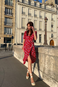 Experience timeless elegance with the Jeanne Dress! Inspired by a French Bond girl, this red floral jonquille printed dress is perfect for any occasion. With its upper protection and flattering cut, this dress is sure to make you feel like a stylish spy on your own thrilling adventure. Limited stock available, get it now before it's gone again!