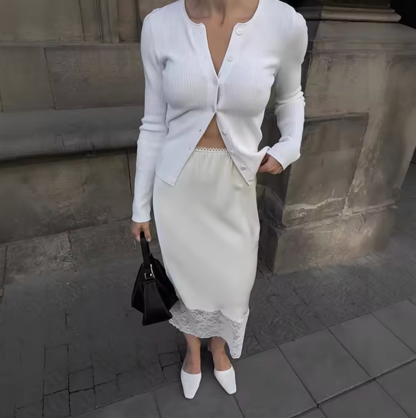 Elevate your wardrobe with the Margot Lace Skirt, an elegant satin piece designed for the modern professional woman. Featuring a high waist and graceful lace splice detail, this long skirt combines sophistication with comfort, ideal for summer wear. Its refined silhouette enhances your figure while maintaining a polished look suitable for any formal or business setting. The breathable satin fabric ensures all-day comfort, making it a versatile addition to your seasonal collection.