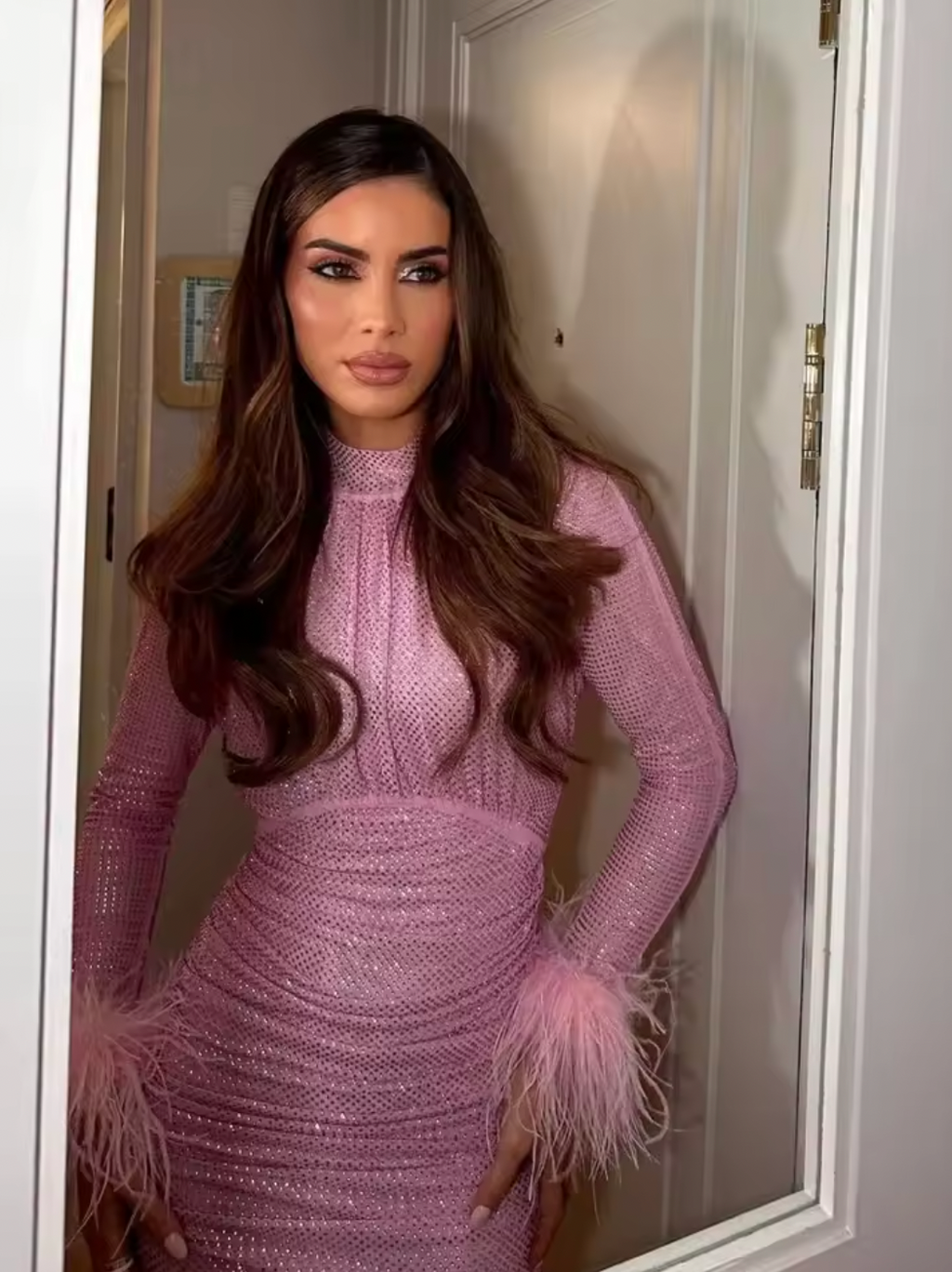 Elevate your wardrobe with our Stretch-mesh Mini Dress. Fully lined for comfort, this dress boasts a hidden back zipper closure and ruched mesh jersey fabric adorned with allover sequins. Perfect for any special occasion, embrace sophistication and exclusivity with this luxurious piece.