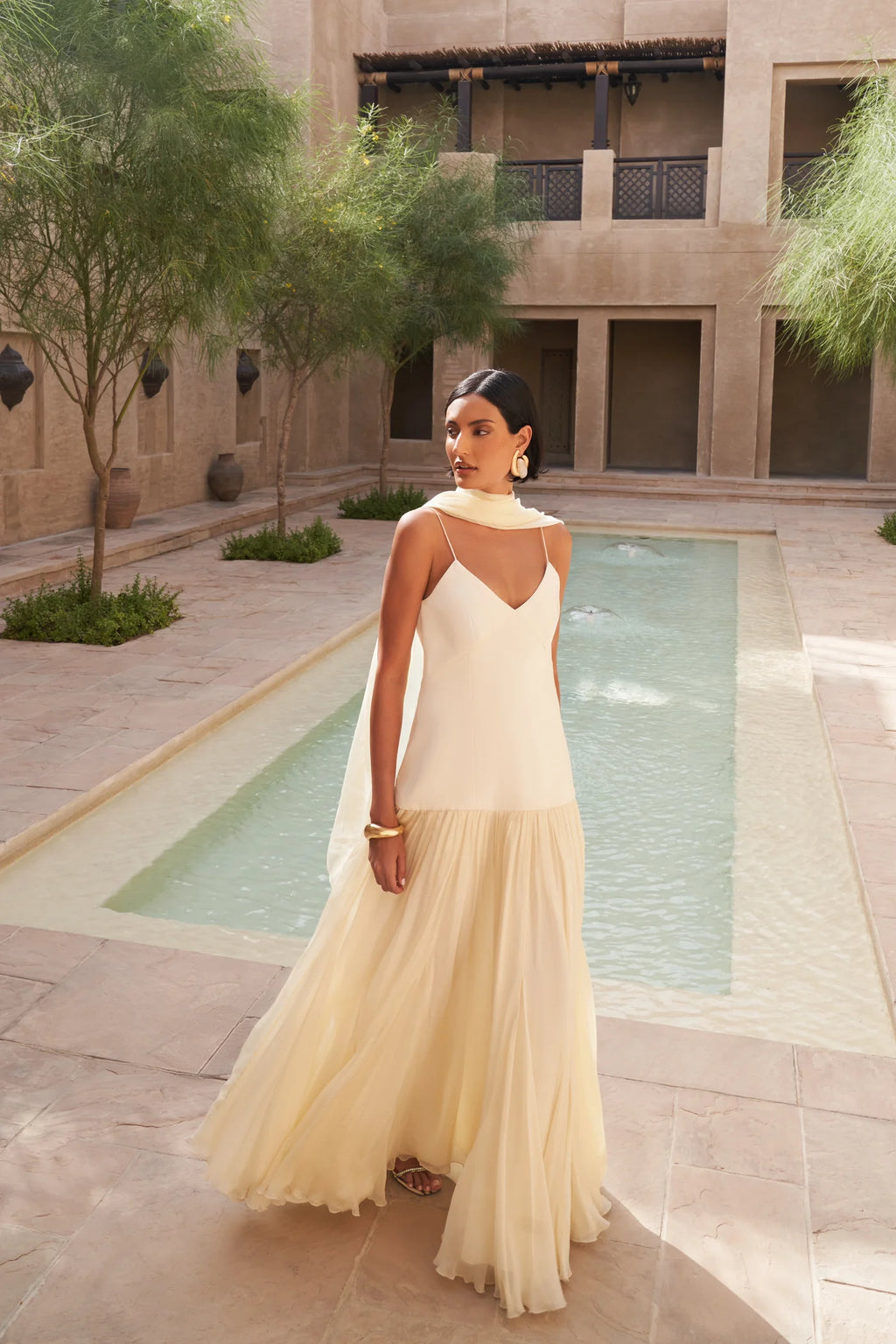 The Fia Maxi Dress embodies relaxed elegance with its timeless silhouette and flowing drop-waist design. Crafted to move gracefully with you, it drapes gently over the body for a flattering and effortless fit that never clings. Perfect for those seeking understated sophistication and comfort in one seamless piece.