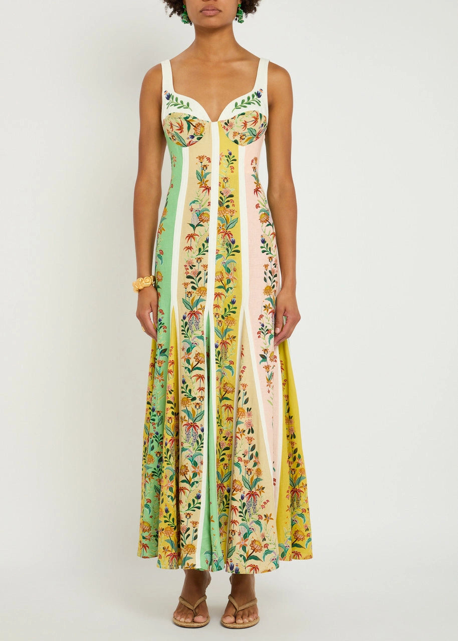 This sophisticated maxi dress from Farm Rio combines a linen-blend fabric with a delicate floral print and striking striped color-block panels. Featuring a flattering sweetheart neckline with a balconette-style bust, it offers an elegant silhouette. The concealed hook and zip fastening at the back ensures a seamless fit. Made from 55% linen and 45% viscose, this dress provides breathable comfort and graceful movement ideal for refined daytime or evening occasions.