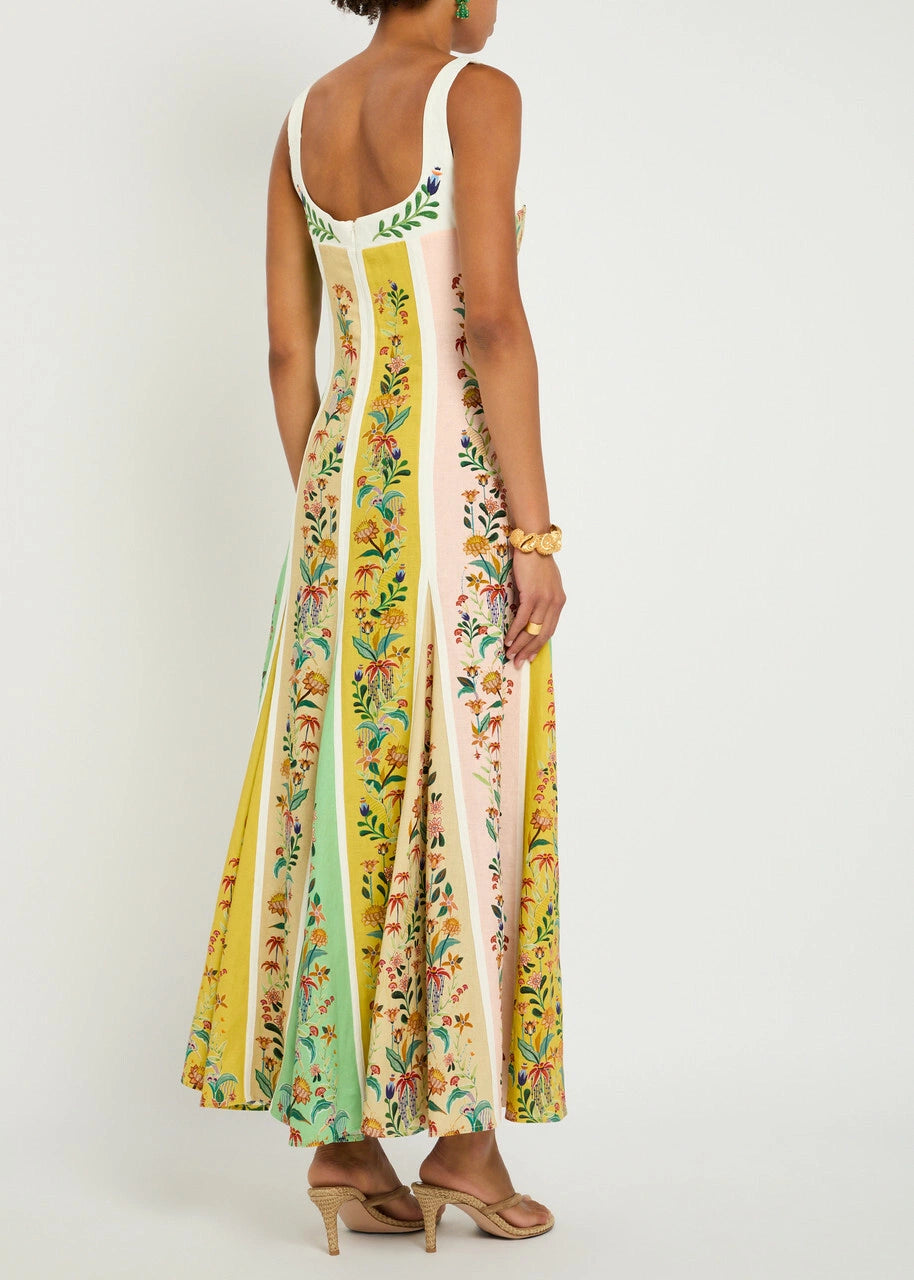 This sophisticated maxi dress from Farm Rio combines a linen-blend fabric with a delicate floral print and striking striped color-block panels. Featuring a flattering sweetheart neckline with a balconette-style bust, it offers an elegant silhouette. The concealed hook and zip fastening at the back ensures a seamless fit. Made from 55% linen and 45% viscose, this dress provides breathable comfort and graceful movement ideal for refined daytime or evening occasions.