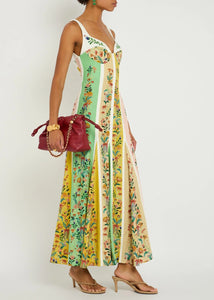 This sophisticated maxi dress from Farm Rio combines a linen-blend fabric with a delicate floral print and striking striped color-block panels. Featuring a flattering sweetheart neckline with a balconette-style bust, it offers an elegant silhouette. The concealed hook and zip fastening at the back ensures a seamless fit. Made from 55% linen and 45% viscose, this dress provides breathable comfort and graceful movement ideal for refined daytime or evening occasions.