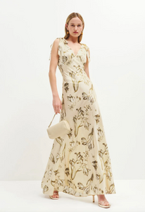 The Pernille Silk Dress exudes understated elegance with its delicate tie straps and flattering v-neck design. Crafted from lightweight silk charmeuse, it offers a graceful drape and subtle sheen. The Ivory colorway features a more substantial, higher-quality silk, lending a richer feel and justifying its exclusive price. This refined piece promises timeless sophistication for those who appreciate exquisite craftsmanship and luxurious fabric.
