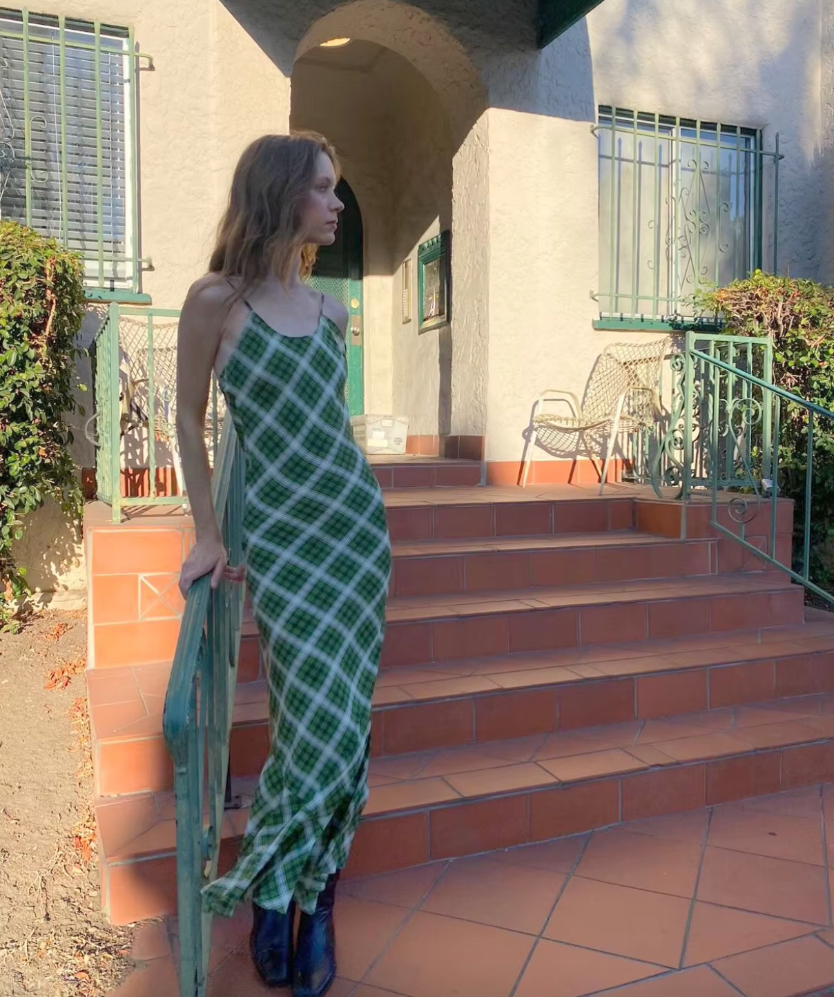 Indulge in luxury with the Juliette Dress. Crafted from French light luxury silk, this vintage green plaid dress features a unique diagonal cut and a large swing fishtail skirt for a stunning silhouette. With its long straps, it can be styled in multiple ways to suit your mood and occasion. Elevate your wardrobe with this must-have dress.