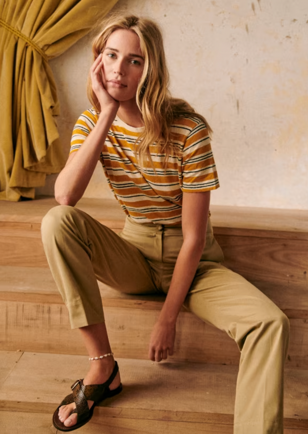 The Martha T-Shirt in Black Ocher combines breathable cotton and linen fabrics for exceptional comfort and durability. Its short sleeves and round neckline offer a classic silhouette suitable for versatile styling. This lightweight tee is ideal for warm weather, providing a refined yet relaxed look with natural fibers that ensure softness and long-lasting wear.