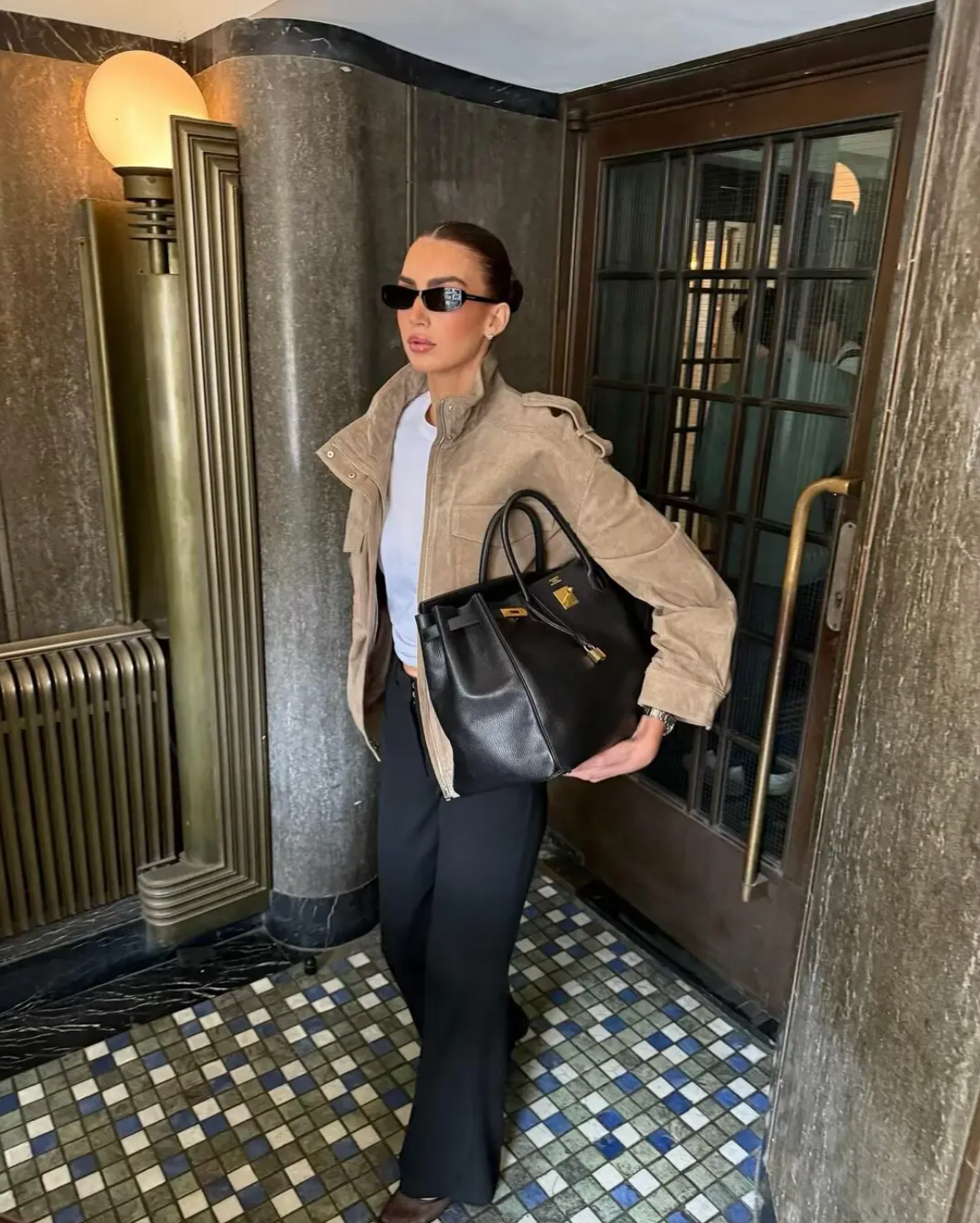 This Suede Jacket combines timeless sophistication with practical design. Crafted from soft suede leather, it features a high collar that provides extra warmth and a refined look. Long cuffed sleeves with shoulder tabs enhance its rugged appeal, while front and chest flap pockets offer convenient storage without sacrificing style. 