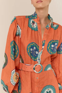 The Noddy Dress in Orange Plates by Palm Noosa showcases a refined midi silhouette crafted from 100% premium linen. Its relaxed fit is complemented by elegant blouson sleeves with elasticated cuffs, a sleek stand collar, and a button-front design. A matching buckle belt allows you to define your waist gracefully, enhancing the dress’s flattering drape. Perfect for an effortless yet polished look, this dress combines comfort and style with sophisticated ease. Please consult our size guide for the best fit.