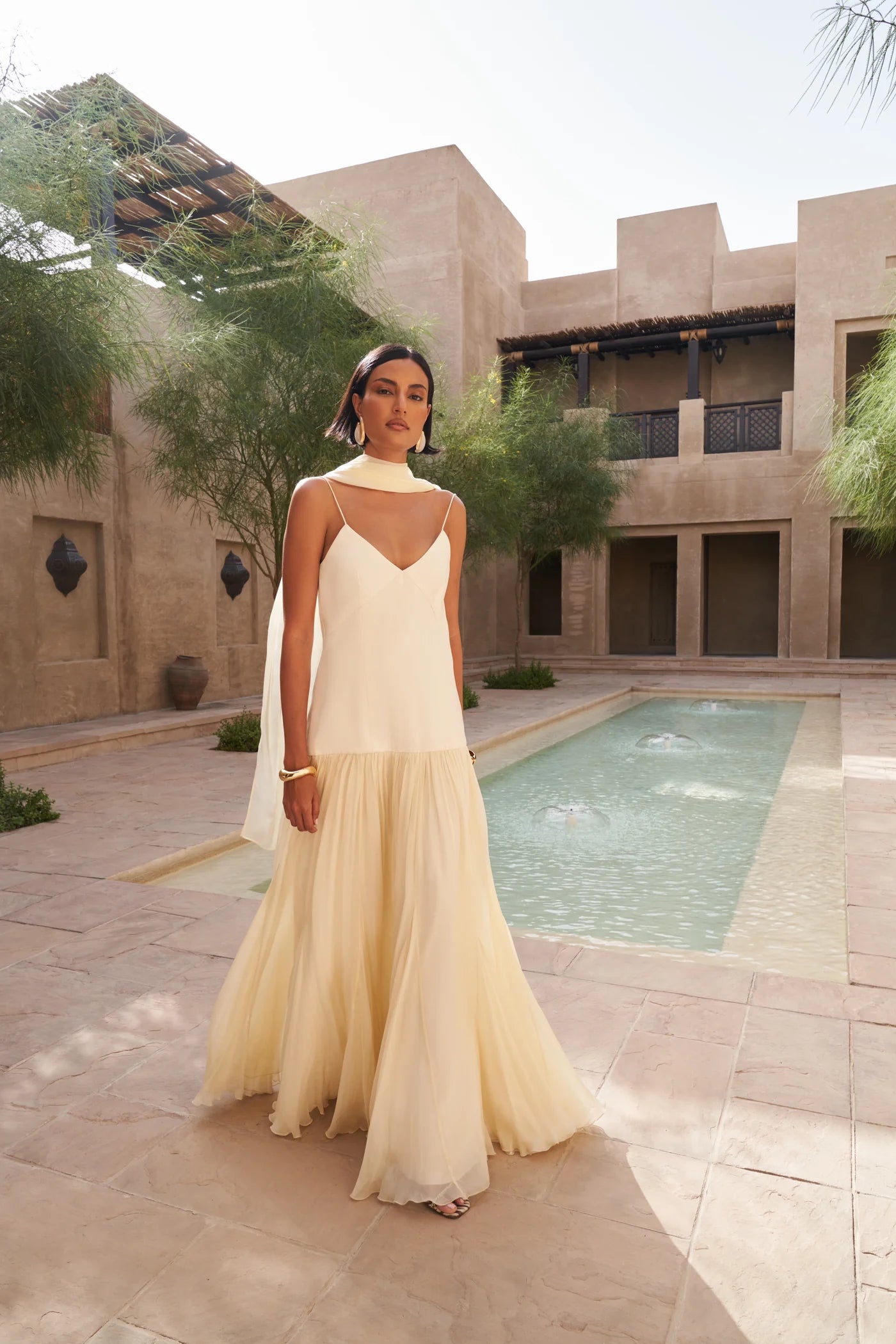 The Fia Maxi Dress embodies relaxed elegance with its timeless silhouette and flowing drop-waist design. Crafted to move gracefully with you, it drapes gently over the body for a flattering and effortless fit that never clings. Perfect for those seeking understated sophistication and comfort in one seamless piece.