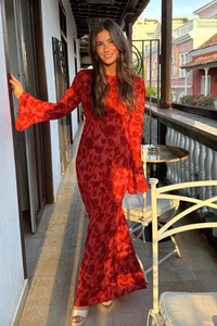 Bell sleeves and floor length - the Gia is the ultimate refined 70's elegance. Think intoxicating nights in MarBell sleeves and floor length - the Gia is the ultimate refined 70's elegance. Think intoxicating nights in Marrakech as you breeze through wearing the Gia. For all our glamazon Dreamgirls, this is the dress you have been waiting for.