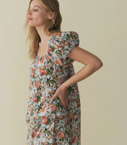 The Julie Cotton Mini Dress in Calico Garden by Doen combines lightweight cotton fabric with a delicate floral print for breathable comfort and timeless style. Its mini length and tailored fit offer a flattering silhouette suitable for warm days and casual outings, while the soft material ensures ease of movement. Ideal for those seeking an effortless yet refined look, this dress blends classic design with everyday practicality.
