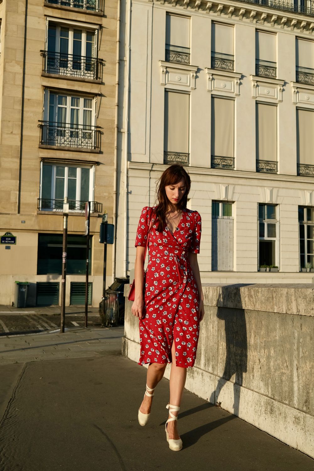 Experience timeless elegance with the Jeanne Dress! Inspired by a French Bond girl, this red floral jonquille printed dress is perfect for any occasion. With its upper protection and flattering cut, this dress is sure to make you feel like a stylish spy on your own thrilling adventure. Limited stock available, get it now before it's gone again!