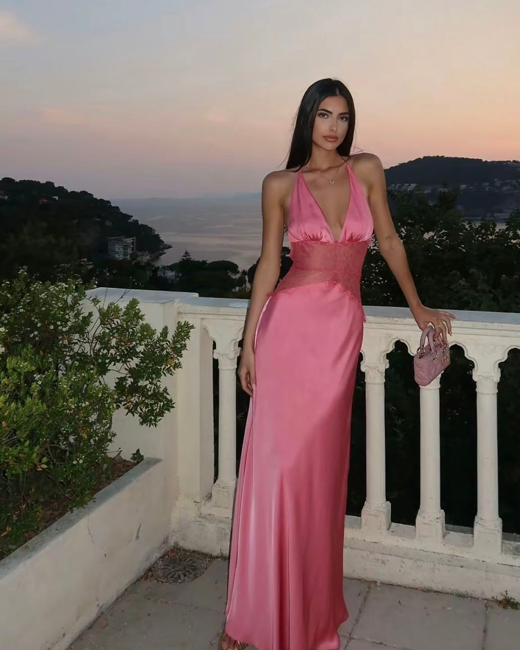 The Dinah Satin Dress offers a refined blend of elegance and allure with its halter tie V-neckline and softly gathered bust. Crafted with a sheer lace body that gracefully follows your silhouette, it features a dramatic low back and a maxi length for timeless sophistication. Partially lined and equipped with an invisible zip, this dress ensures a flawless fit and subtle coverage, perfect for making a confident statement at any special occasion.